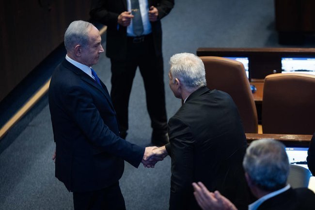 Премьер-министр Израиля Биньямин Нетаниягу и лидер оппозиции Яир Лапид.