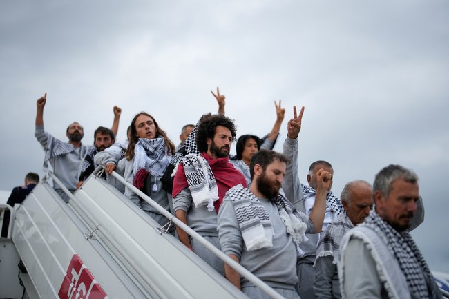 Активисты флотилии «Сумуд» прибывают в Стамбул после депортации. Фото: AP Photo/Emrah Gurel